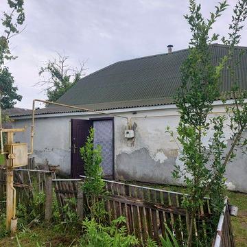 Будинок із земельною ділягкою під сільське господарство 0.1500 га
