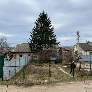 Дорожня вул., 18
