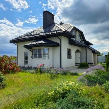 Продам сучасний будинок у Безлюдівці з гаражем і підвалом, 15 соток