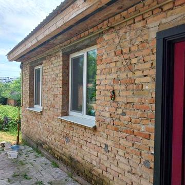 Продам 1/2 будинку  центр міста