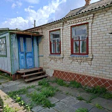 Продам 1/2 часть дома г Вольнянск ул Запорожская 49а