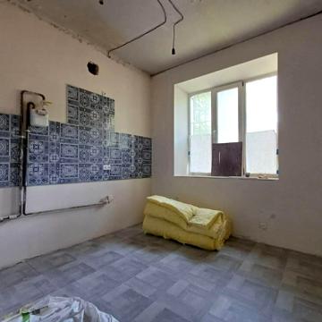 Степана Тільги вул. (Революційна), 12