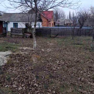 Продам територію з двома старими будинками під знос
