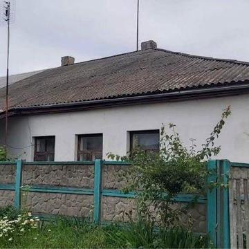 Продаж будинку/квартири + земельна ділянка під гараж
