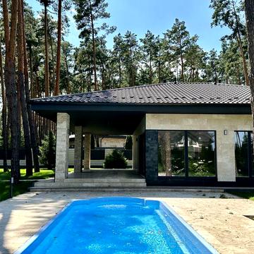 Купити будинок з басейном у лісовій Бучі