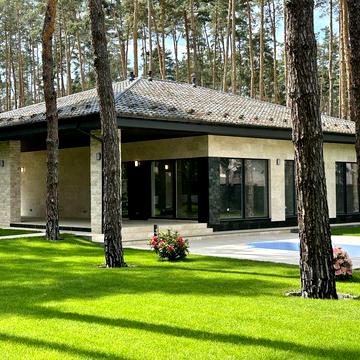 Купити будинок з басейном у лісовій Бучі