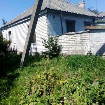 Продам половину будинка в районі Першої міської лікарні