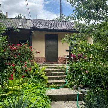 Продам уютный  дом с плодоносящим садом в Ржищеве — участок 26 соток!