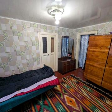 Будинок на Роменській з місцем для авто