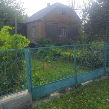 Продам гарний добротний будинок по вул.Сергієнко з прибудовами, землею