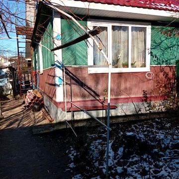 Деревяний будинок з трьох кімнат