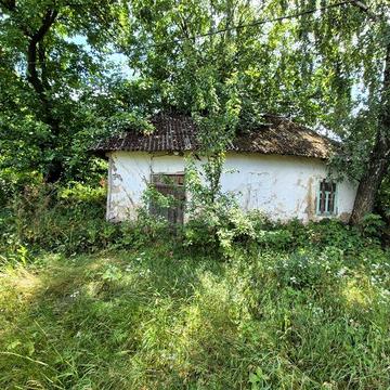 Земельна ділянка з будинком