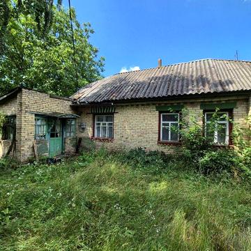 Земельна ділянка з будинком