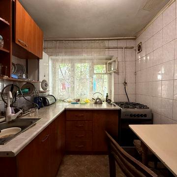 Продаж будинку у центрі міста (загальний двір)