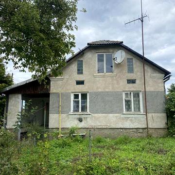 Продаж будинку та земельної ділянки