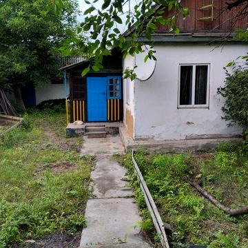 Продам пів будинка