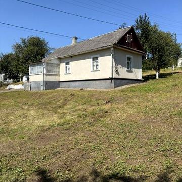 Будинок з ділянкою 25 соток