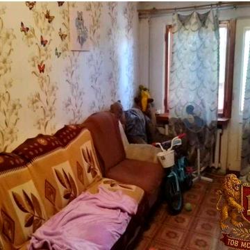 Затишна 2-кімнатна квартира з гаражем та земельною ділянкою.