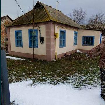 Термвново поодам будинок