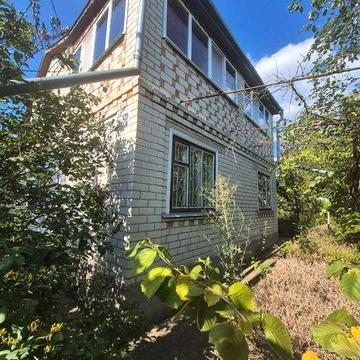 продаж окремого цегляного будинку