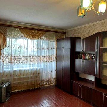 Продається двокімнатна квартира з гаражем, літньою кухнею та садом!