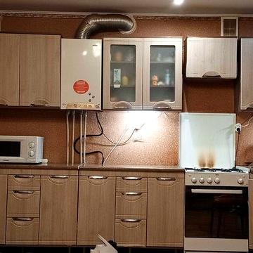 Продам 2-кімнатну квартиру з ділянкою та гаражем