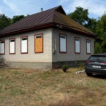 Будинок цегляний з ділянкою 0,36 га