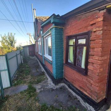 Продам будинок на 2 входи в районі військового містечка