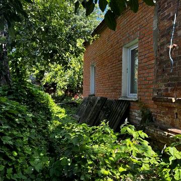 Продам 1/2 будинку в центрі міста Ромни