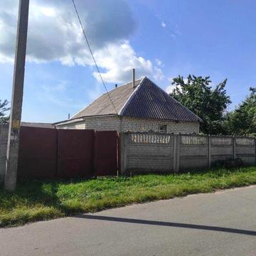 Будинок та земельна ділянка