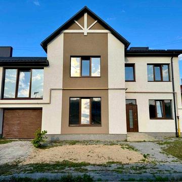 Продам кутовий котедж з гаражем в районі Автовокзалу