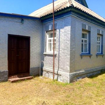 Продам будинок в передмісті Гадяча з земельною ділянкою