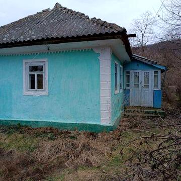 Хата з гоподарчими прибудовами
