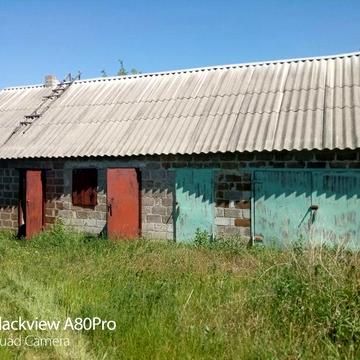 Продам дачний будинок та недобудований будинок в районі