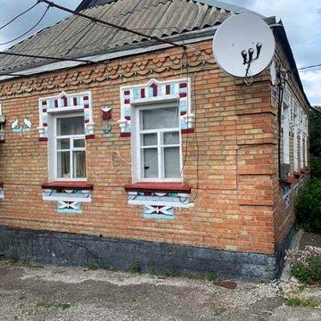 Приватний будинок у місті( біля міського саду)