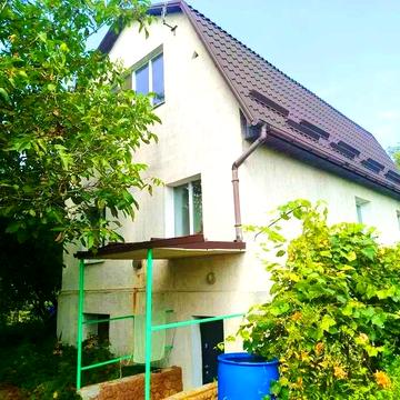 Продам будинок с.Миколаївка.Кладова,гараж,баня,камін,альтанка,сарай