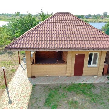 Продаж - двоповерховий дачний будинок з виходом до ріки с. Новоселівка