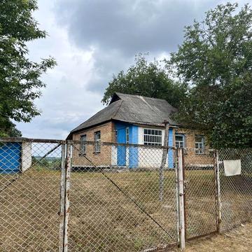 Продається земельна ділянка з будинком