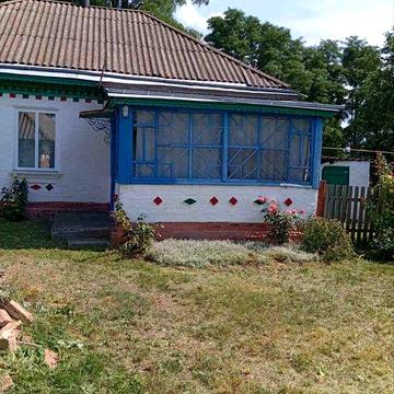 Будинок  з ділянкою