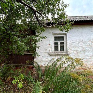 Продаж окремо стоячого будинку з великою ділянкою 10сот в центрі міста