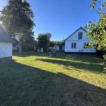 Будинок з земельною ділянкою 28 соток