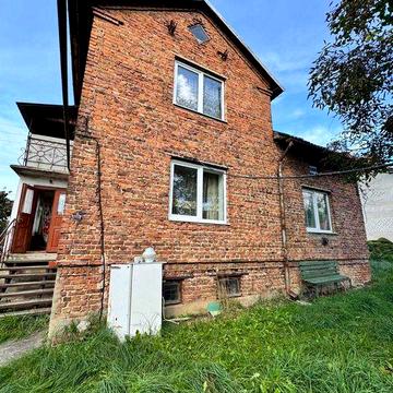 Продаж будинку в Мостиськах з ділянкою 20 сот