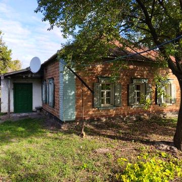 Земельна ділянка з будинком