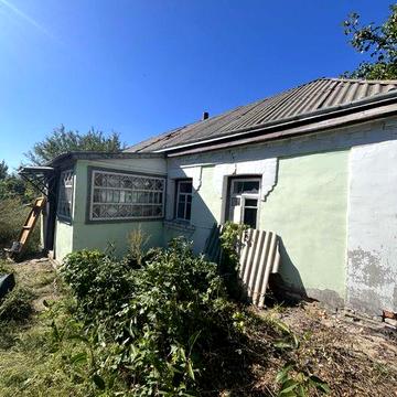 Продам житловий будинок із земельною ділянкою