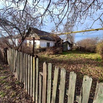Продаж глинобитного будинку із земельною ділянкою 10 с