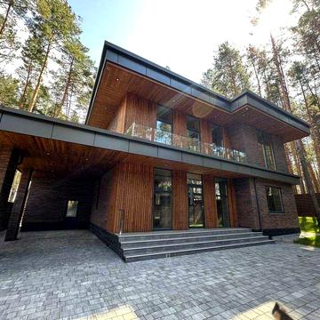 Будинок в стилі Райта- органічно, природньо.ПРОСТІР.ЛІС