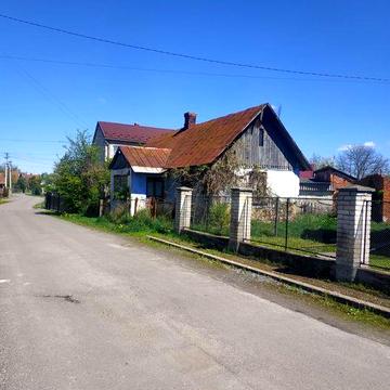 Продається земельна ділянка з будинком