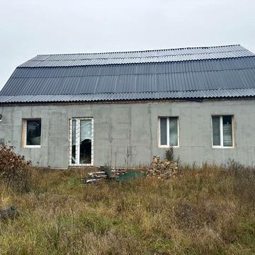 Гарний будинок в с. Мощун з земельною ділянкою 10 сот