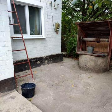 Продам в Харківській  обл, м.Балаклії 1/2 частку часного будинка.