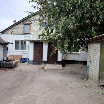 Продам в Харківській  обл, м.Балаклії 1/2 частку часного будинка